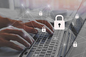An image of a pair of hands typing on a laptop. Overlaid on the image are icons of padlocks linked to each other.