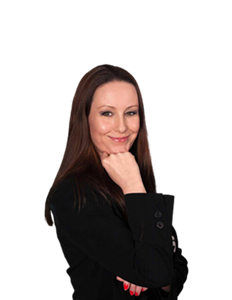 A photo of Alice Austin. She has brown hair and is wearing a black blazer.