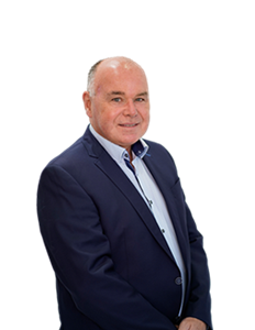 A photo of Fergus Murphy. Fergus Murphy is clean-shaven, wearing a navy suit jacket over a light blue shirt.