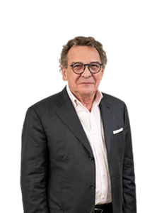 A photo of Marcel Cezar. Marcel is wearing a white shirt with a grey blazer.